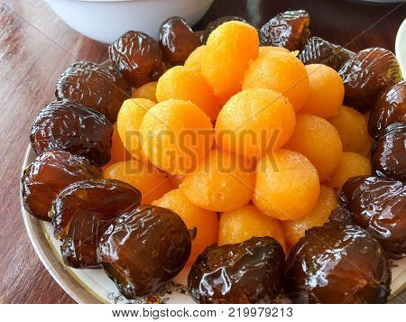 sweety gloden drop make form Egg yolk drops blended with wheat, a traditional Thai dessert