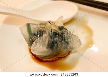 Close up of Single green Hongkong stlye steamed dumpling in morning