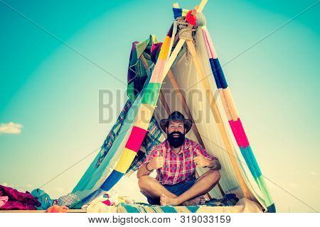 Camping. Homemade Tent Camping For Free Man. Travel Homemade Tent. Hut Of Branches. You Cant Buy Lov