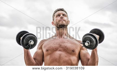 Doing His Best. Man Sportsman With Strong Ab Torso. Steroids. Fitness And Sport Equipment. Muscular 