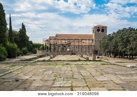 Panoramic View Of San Giusto Cathedral And Roman Forum Ruins In Trieste, Northern Italy