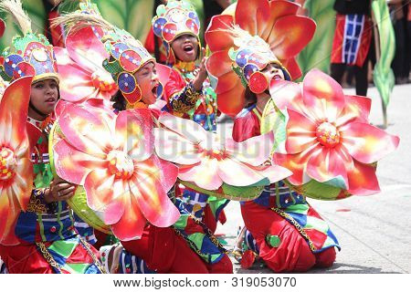 Davao City, Philippines-august 2014: Performers In Their Colorful Props At The Streetdancing Competi