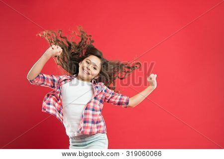 Going To Prom. Cute Small Girl With Wavy Prom Hairstyle On Red Background. Adorable Little Child Wit