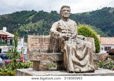 Mongui, Colombia - August, 2019: Monument To The Priest Alonso Ojeda Soto At The Central Square Of M