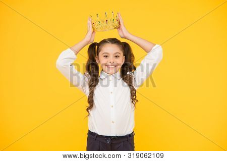 Winner Revealed Happy Little Prize Winner Putting Crown Jewel On Head On Yellow Background. Adorable