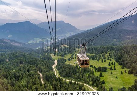 Seceda, Italy - July 25, 2019 : Cable Cars Being Used To Trasport People To The Top Of Seceda Mounta