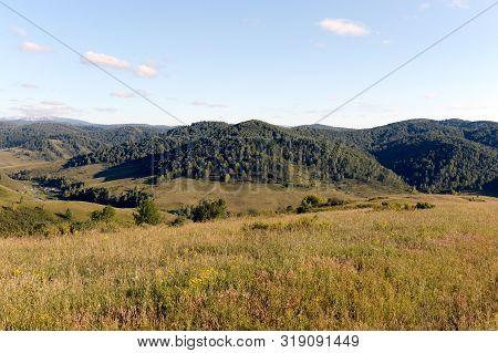 Landscape In The Vicinity Of The Taiga Village Generalka In The Mountains Of The Altai Territory. We