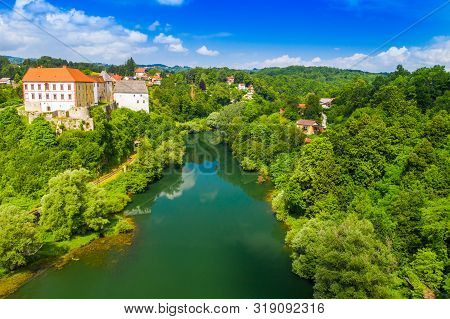 Aerial Drone View Of The River Kupa And Ozalj Castle In The Town Of Ozalj, Croatia