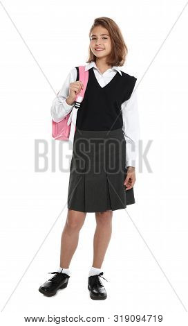 Happy Girl In School Uniform On White Background