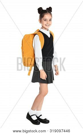 Happy Girl In School Uniform On White Background