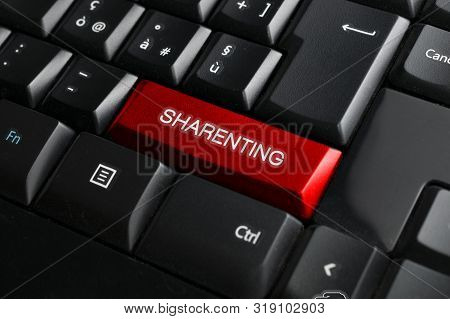 Sharenting (overuse Of Social Media By Parents To Share Content About Their Children) Concept: Black