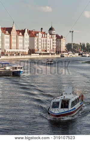 Kaliningrad, Russia - August 24, 2019: View Of The Fish Village And Lighthouse On The Embankment Of 