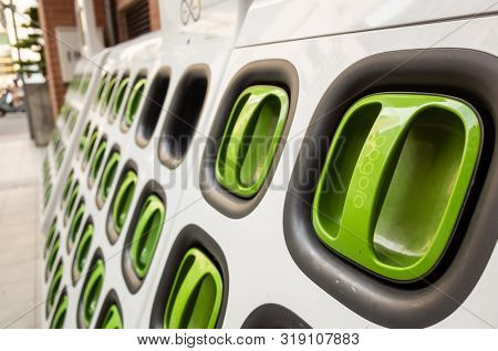Taipei, Taiwan - August 17th, 2019: charging station for battery packs of Taiwan-based Gogoro electronic motocycle at street in Taipei, Taiwan, Asia