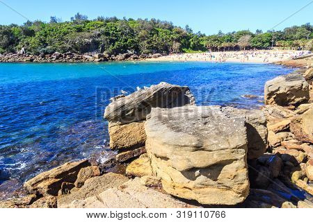 View Over The Rocks In Manly, Australia Looking Towards Shelly Beach.