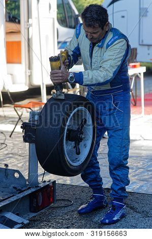 Chamrousse, France, August 25, 2019 : Mechanic At Work During The Annual Uphill Car Race, Counting F