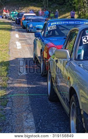Chamrousse, France, August 25, 2019 : Historic Racing Cars Drive To The Start Of Uphill Race, Counti