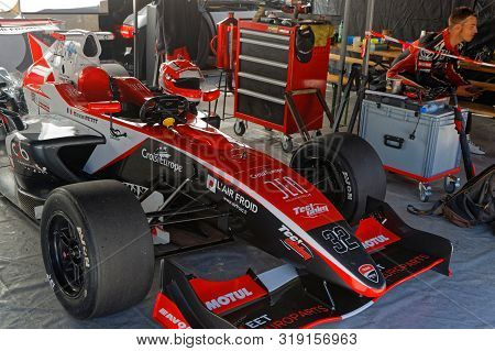 Chamrousse, France, August 25, 2019 : Young Driver Kevin Petit In The Paddock Of The Annual Uphill C