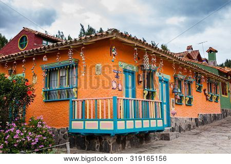 Duitama, Colombia - August, 2019: Beautiful Facades Of The Houses At The Touristic Place Called Pueb