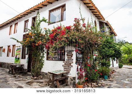 Duitama, Colombia - August, 2019: Beautiful Facades Of The Houses At The Touristic Place Called Pueb
