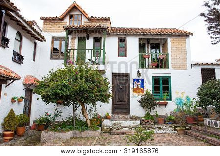 Duitama, Colombia - August, 2019: Beautiful Facades Of The Houses At The Touristic Place Called Pueb