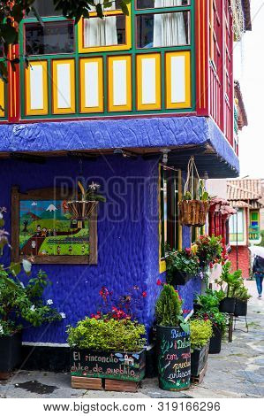 Duitama, Colombia - August, 2019: Beautiful Facades Of The Houses At The Touristic Place Called Pueb