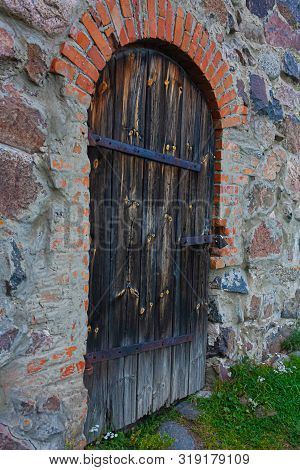 Ancient Fortress Gate In The Stone Wall Of The Karela Fortress