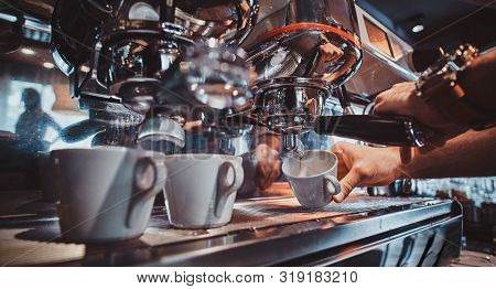 Process Of Coffee Making Using Coffee Machine At Restaurant By Talanted Barista.