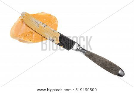 Top View Of Knife And Open Sandwich With Fresh Bread And Peanut Butter Isolated On White Background