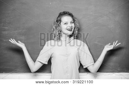 Teaching Could Be More Fun. Woman Teacher In Front Of Chalkboard. Teacher Explain Hard Topic. Import
