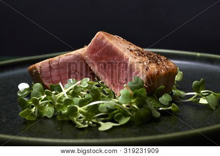 Seared Tuna Steak With Microgreen As Garnish