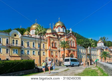 New Athos, Abkhazia-july 29, 2014: The Architecture Of The Ancient Monastery Against The Blue Sky.
