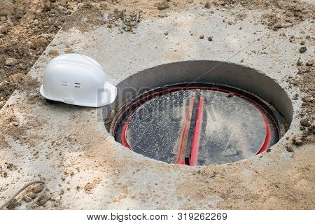 Builder Hatch And Work Helmet On The Ground, Top View