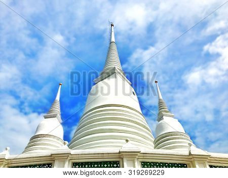 Thai White Pagoda With Blue Cloud Sky At Wat Prayurawongsawas Waraviharn Temple Bangkok.