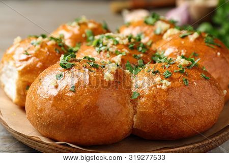 Traditional Ukrainian Garlic Bread (pampushky) On Wooden Table, Closeup