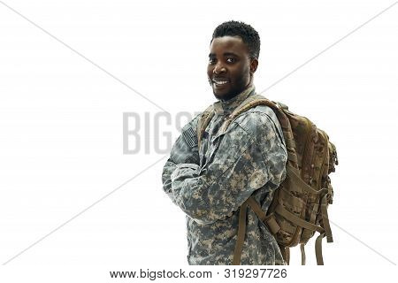 Positivity American Ranker With Big Backpack Confidently Standing With Crossed Hands And Smiling At 