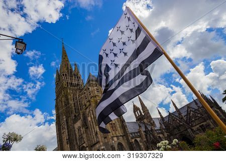 Le Folgoet, his church and Gwenn-ha-Du flag, lovely village in Brittany, France