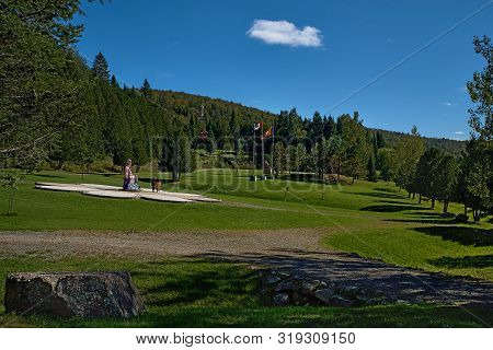 Harrington, Qc, Canada - September 23, 2018: Tourists At The Tam Bao Son Buddhist Temple In Quebec D