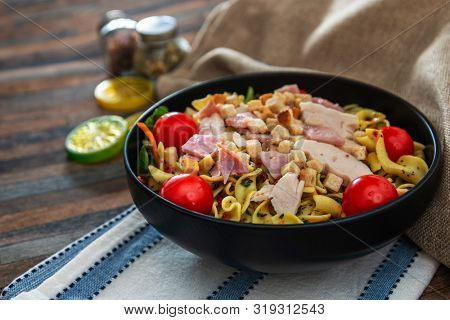 cereal specialties cooked with salad, roasted chicken aiguillette cured with salted and bacon