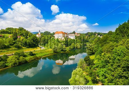 Beautiful Old Castle Of Ozalj, Aerial Drone View Of The River Kupa In The Town Of Ozalj, Croatia