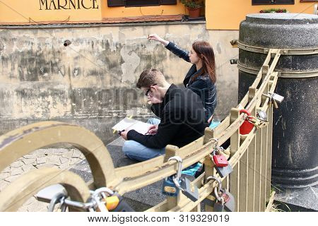 Prague, Czech - April 24, 2012: These Are Unidentified Young Artists Who Make Sketches From Life On 