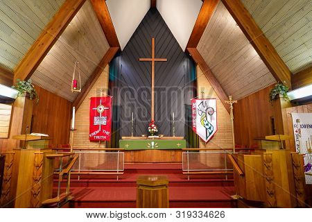 Springfield, Il/usa-8/25/19:an Empty Small Church With The Deocrated Altar, A Large Cross And Pulpet