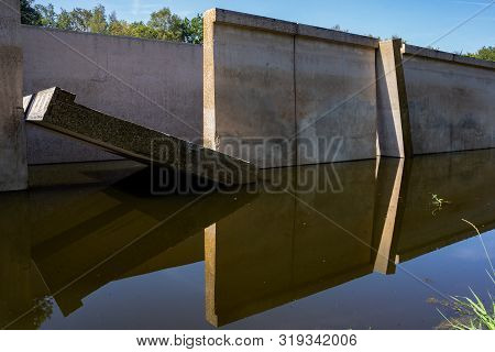 Waterloopbos, The Netherlands, August 25, 2019: The Concrete National Monument, Reflecting In The Su