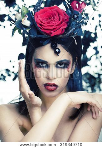 Pretty Brunette Woman With Rose Jewelry, Black And Red, Bright Make Up Kike A Vampire Closeup Red Li