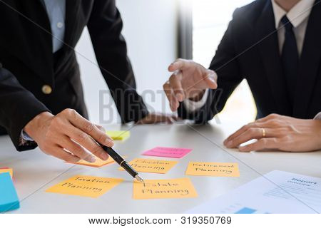 Wealth Management Concept, Business Man And Team Analyzing Financial Statement For Planning Financia