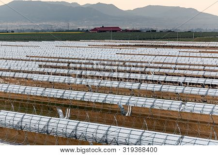 Logrosan, Extremadura, Spain - March 23, 2019: View Of The Concentrators And Solar Panels Of The Sol