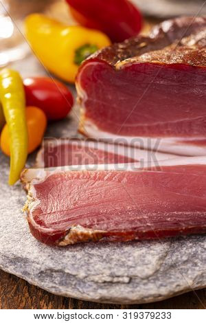 Closeup Of South Tyrolean Speck On Granite