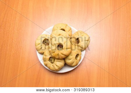 Vak Belyash - Bashkir National Cuisine, Homemade Meat Pies In White Bowl Over Wooden Background