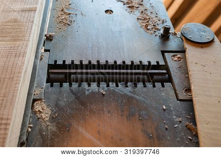 Woodworking Machine With Cutting Board On It Closeup. Selective Focus. Manual Wood Processing Concep