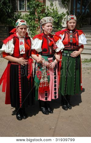 Young dancers in traditional clothe participate at a wedding