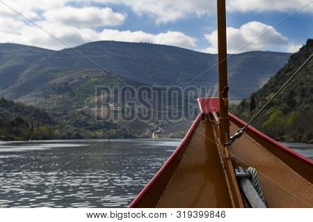 Scenic View Of The Douro River And The Douro Valley From A Rabelo Boat, In Portugal; Concept For Tra